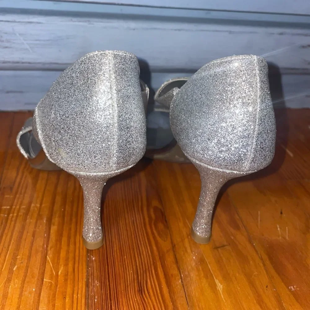 FIONI silver heels size 5.5.  Been worn once.